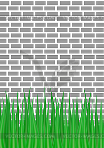 Gray brick wall and green grass of below - royalty-free vector image