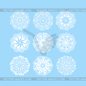 Christmas snowflake decoration set on blue - vector clipart