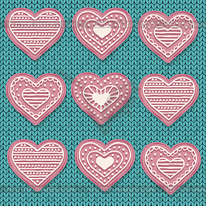 Pink heart cookies on knitted background. Love - vector image