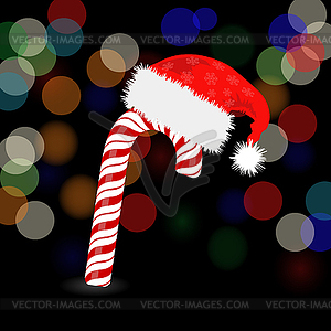 Candy Cane and Hat of Santa Claus - vector image