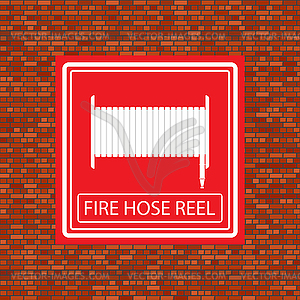Значок катушки пожарного шланга на оранжевой кирпичной стене - векторный клипарт