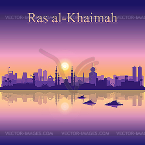 Ras al-Khaimah silhouette on sunset background - vector image