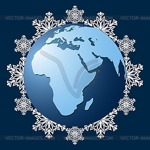 Planet Earth on background of snowflakes, symbol - vector clipart