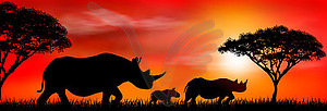 Группа африканских носорогов на закате - клипарт в векторном формате