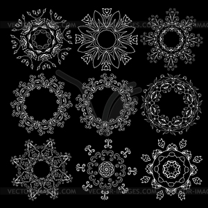 Beautiful ornamental rosettes set. For ethnic or - vector image