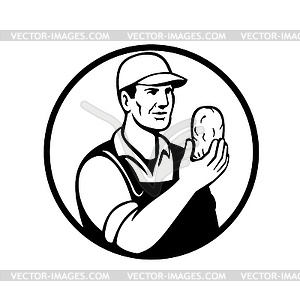 Organic Farmer or Potato Grower Holding Up Potato - vector clipart