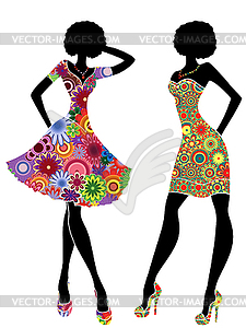Slim stylish women in short ornate colourful dresses - vector image