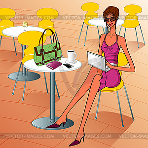 Beautiful business woman sitting in cafe with lapto - vector clipart
