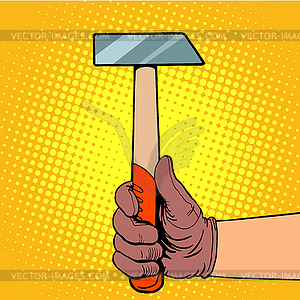 Hand with hammer - vector image