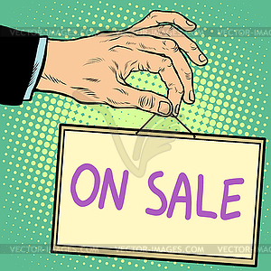 Hand holding sign on sale - vector clipart / vector image