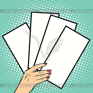 Booklets or tickets in hand - vector clipart