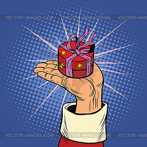 Hand of Santa Claus with round gift box - vector image