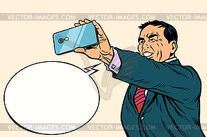 Asian businessman makes selfie - vector clip art