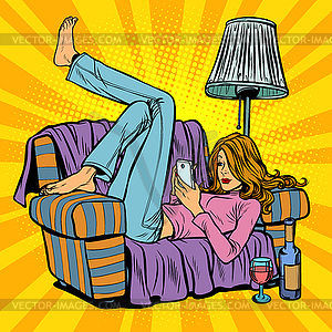 Woman lying on couch and reading smartphone - vector clipart