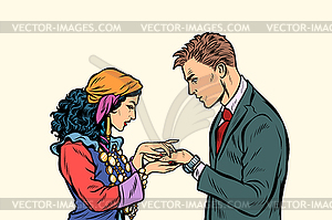 Gypsy telling fortunes by hand to businessman - vector clipart