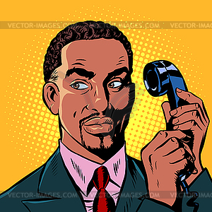Serious african man talking on retro phone - vector clip art