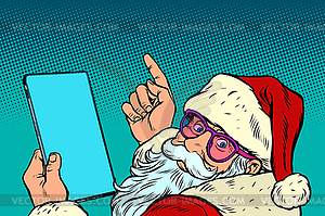 Santa Claus with tablet. New year and Christmas - vector image