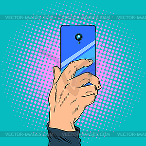 , smartphone in hand takes photo - royalty-free vector image