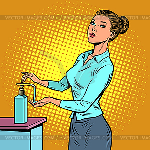 Woman uses hand sanitizer - vector clipart