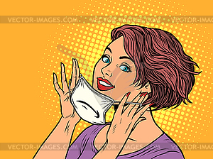 Woman puts on medical mask - vector image