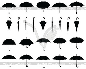 Black silhouettes of umbrellas - vector image