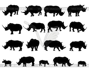Черные силуэты носорогов - изображение векторного клипарта