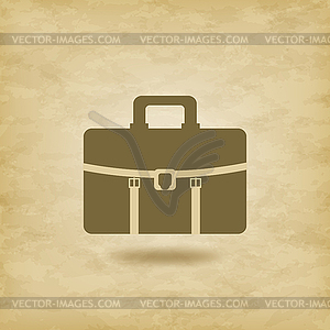 Briefcase icon on grunge background - vector clipart