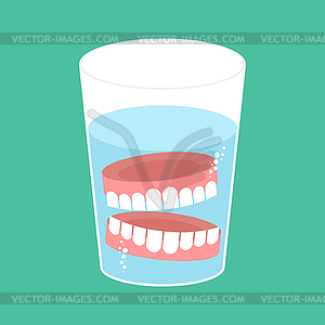 False teeth in glass. False jaw in glass beaker - vector clipart