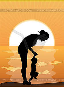 Mother and child at sunset - vector image