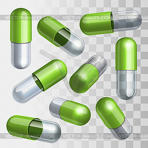 Набор зеленых и прозрачных медицинских капсул в - рисунок в векторе