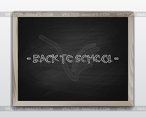 Black chalkboard in wooden frame - vector image