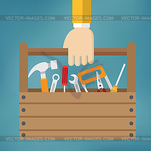 Hand with toolbox - vector clip art