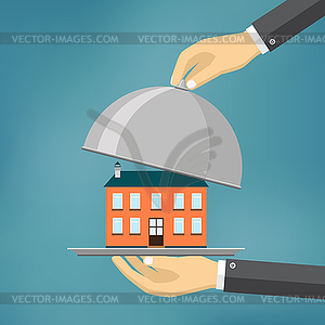 Hand holds house on tray - vector clip art