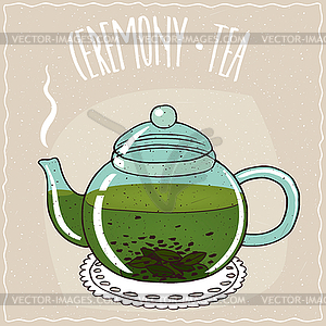 Glass teapot with green tea - vector image