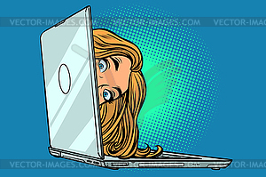 Woman peeking out of laptop - vector image