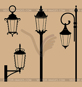 Black lanterns on beige - vector clipart