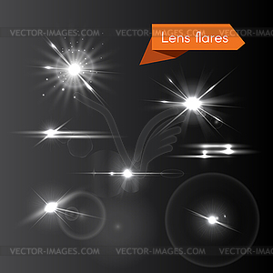 Set of lens flares and glowing white flash elements - vector clipart