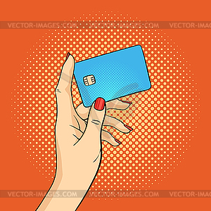 Pop art hand holding credit ca - vector image