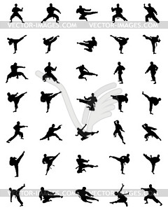 Black karate silhouettes - vector image