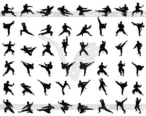 Black karate silhouettes - vector image