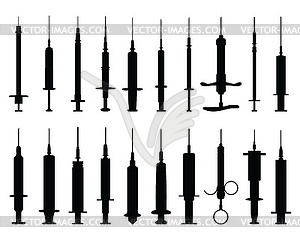 Silhouettes of syringes  - vector clipart