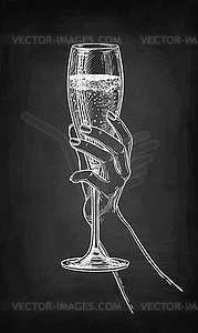 Hand holding glass of champagne - vector image