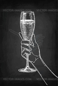 Hand holding glass of champagne - vector clipart
