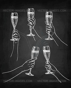 Set of hands with champagne glasses - royalty-free vector image